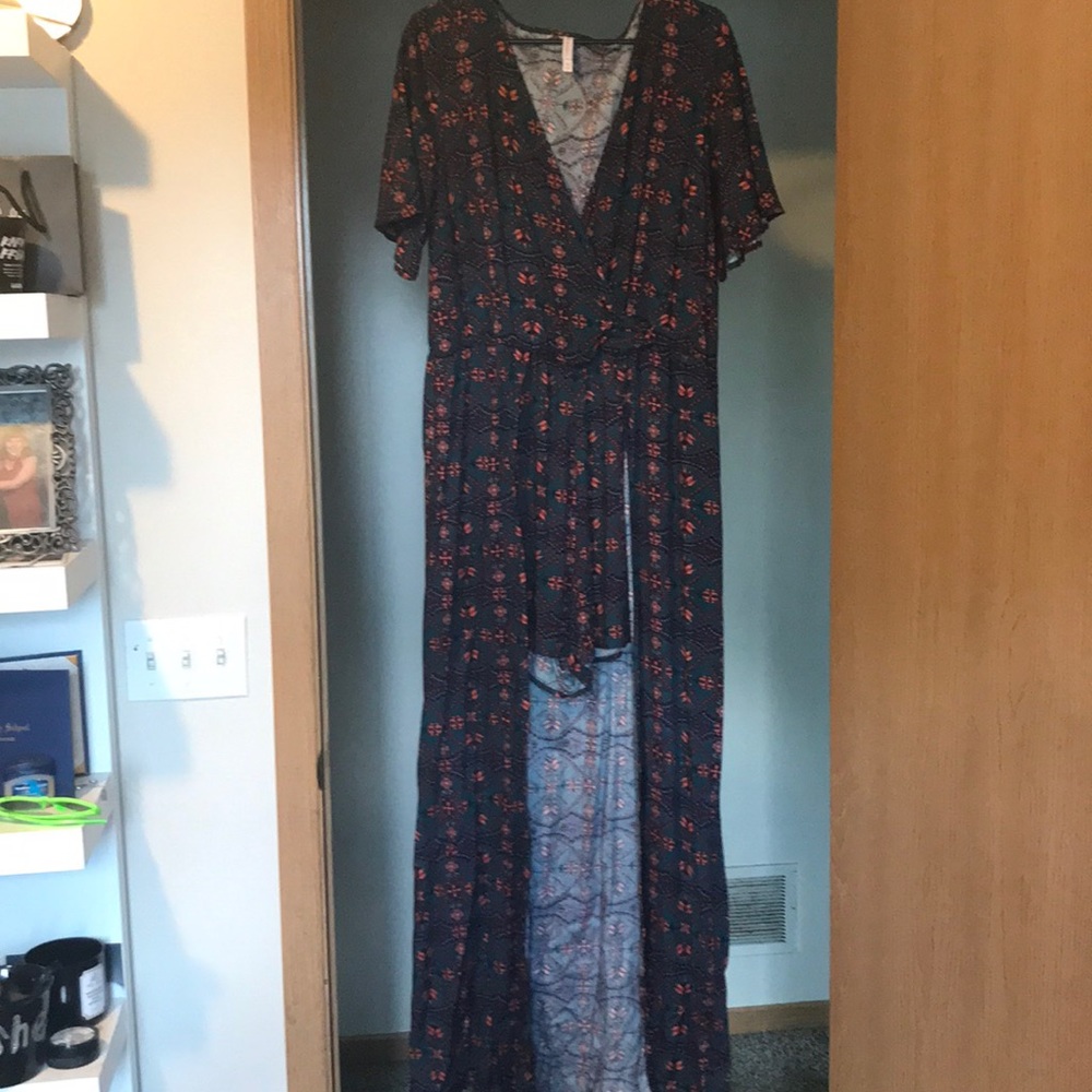 Romper has shorts but high low maxi